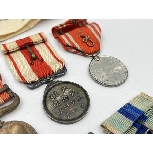 2078 - Seven Japanese medals to include Red Cross, 1904-05 Russo-Japan etc.