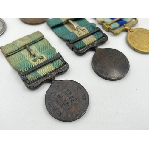 2078 - Seven Japanese medals to include Red Cross, 1904-05 Russo-Japan etc.