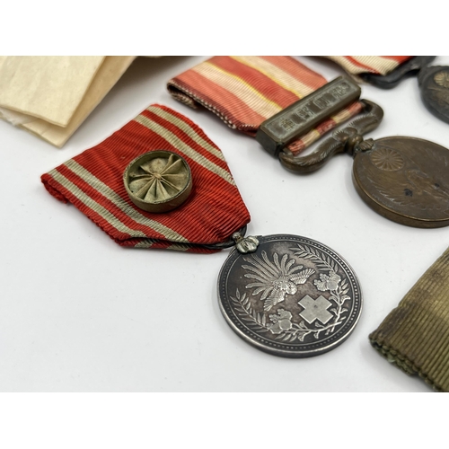 2078 - Seven Japanese medals to include Red Cross, 1904-05 Russo-Japan etc.