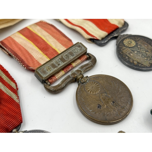 2078 - Seven Japanese medals to include Red Cross, 1904-05 Russo-Japan etc.