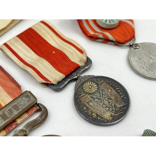 2078 - Seven Japanese medals to include Red Cross, 1904-05 Russo-Japan etc.