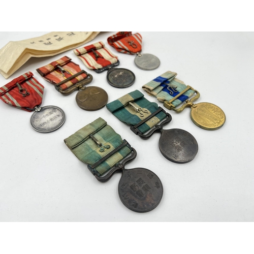 2078 - Seven Japanese medals to include Red Cross, 1904-05 Russo-Japan etc.