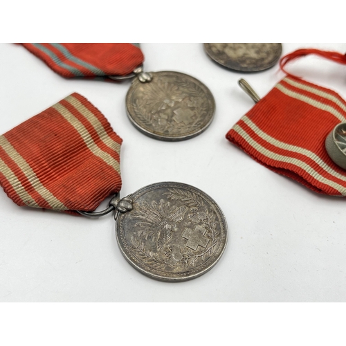 2079 - Nine Japanese Red Cross medals