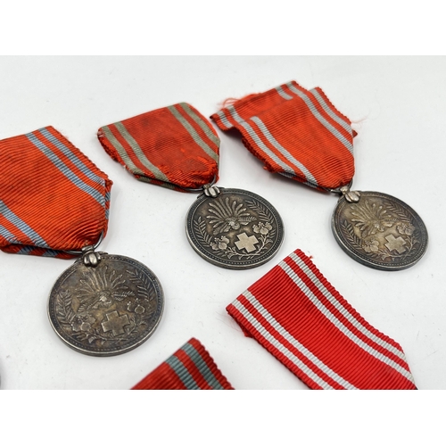 2079 - Nine Japanese Red Cross medals