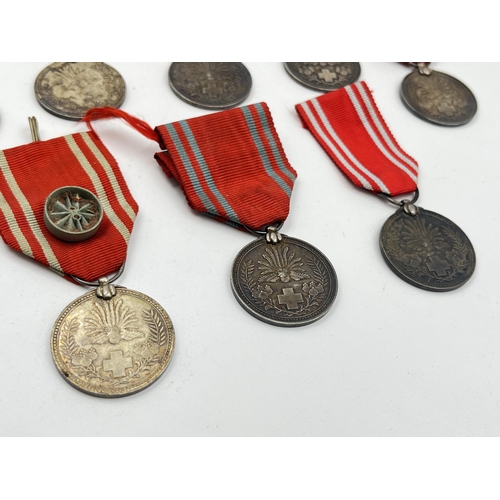 2079 - Nine Japanese Red Cross medals