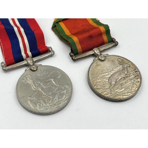 2090 - Two WWII medals presented to W157354 V. R. Quitowitz, one War and one Africa Service