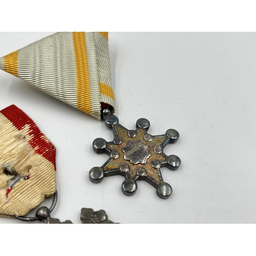 2124 - Three WWII Japanese medals, two Order of The Rising Sun 8th Class and one Order of the Sacred Treasu... 