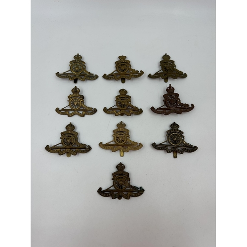 2203 - Ten Royal Artillery cap badges