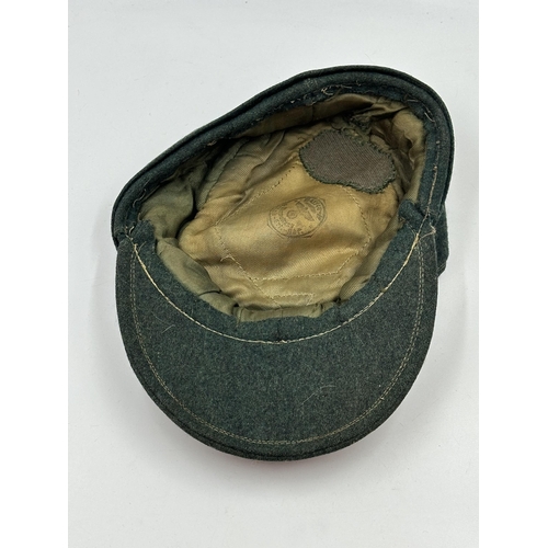 2230 - A WWII Waffen SS M43 ski cap with 