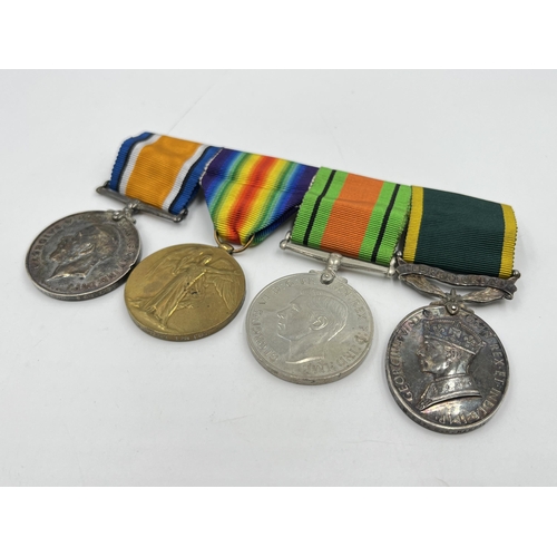 2015 - A British medal group comprising WWI war medal presented to 306227 Pte. G. Harrison Lan. Fus., WWI V... 