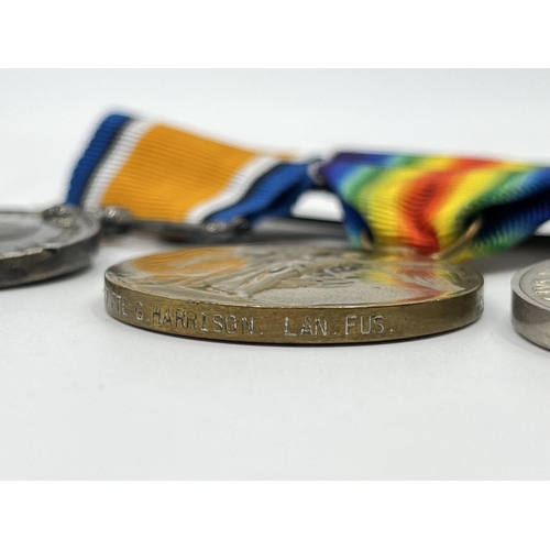 2015 - A British medal group comprising WWI war medal presented to 306227 Pte. G. Harrison Lan. Fus., WWI V... 