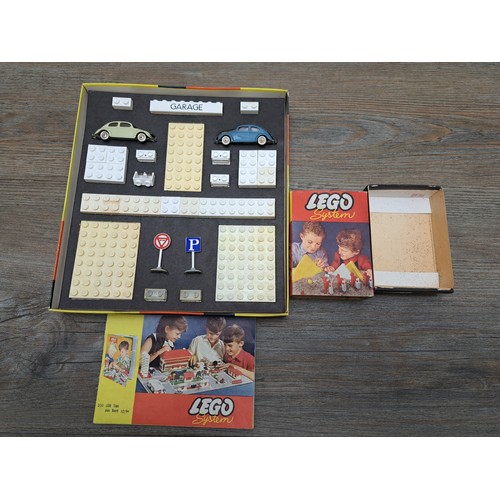 524 - Three 1950s Lego System construction sets comprising No. 306, No. 700/1 and No. 700/5 together with ... 