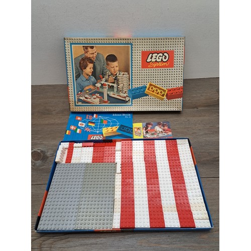 524 - Three 1950s Lego System construction sets comprising No. 306, No. 700/1 and No. 700/5 together with ... 