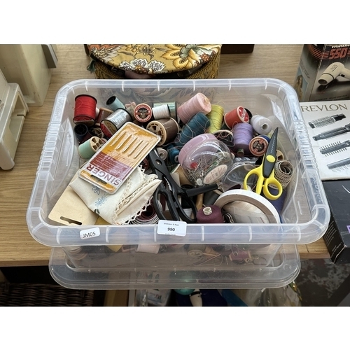 990 - A box containing a large quantity of cotton reels and sewing accessories