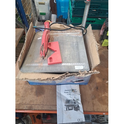 1053A - A boxed B&Q diamond wheel 450w power tile cutter