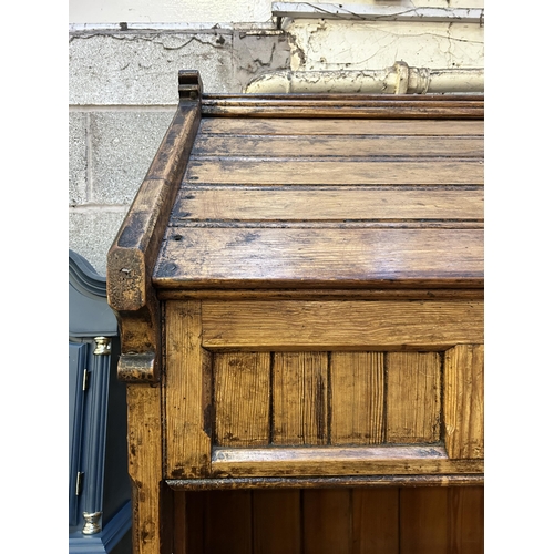 19 - A 19th century ecclesiastical pitch pine freestanding bookcase - approx. 208cm high x 137cm wide x 3... 