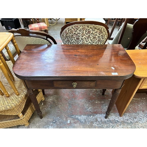 57 - A 19th century mahogany fold over tea table - approx. 77cm high x 93cm wide x 47.5cm deep