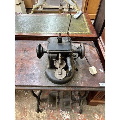 69 - An early 20th century Allbook & Hashfield Ltd. leather/fur treadle sewing machine