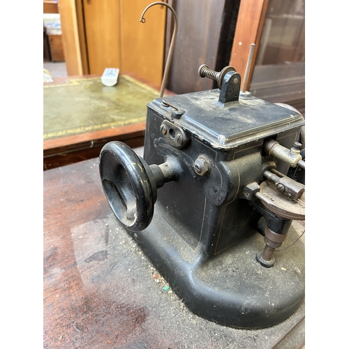 69 - An early 20th century Allbook & Hashfield Ltd. leather/fur treadle sewing machine