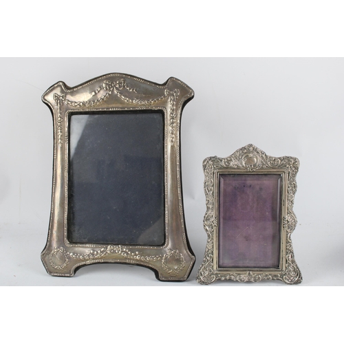 2132 - Two hallmarked .925 sterling silver photograph frames - largest approx. 31.5cm high x 24cm wide