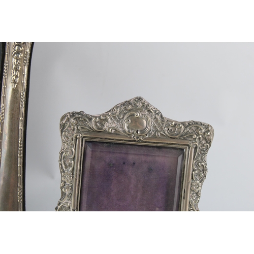 2132 - Two hallmarked .925 sterling silver photograph frames - largest approx. 31.5cm high x 24cm wide