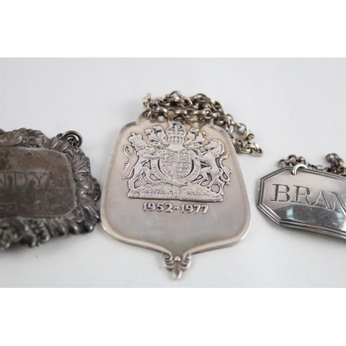 2135 - Four hallmarked .925 sterling silver decanter labels - approx. gross weight 68g