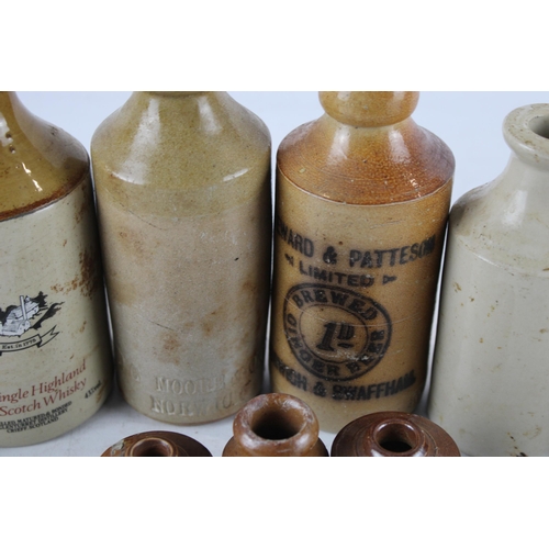 334 - A collection of stoneware bottles