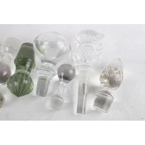 337 - A collection of glass decanter stoppers