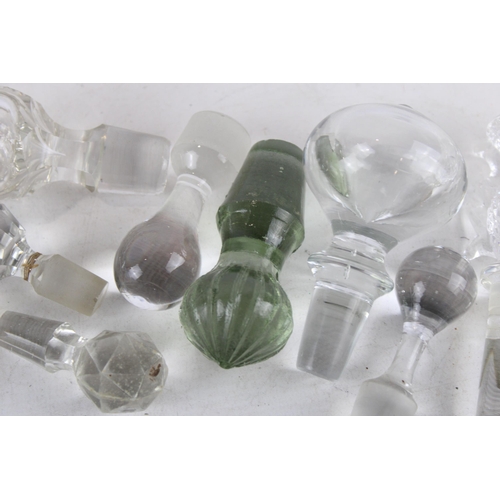 337 - A collection of glass decanter stoppers