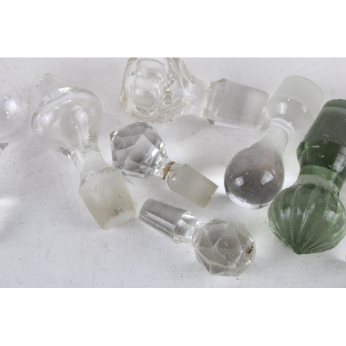 337 - A collection of glass decanter stoppers