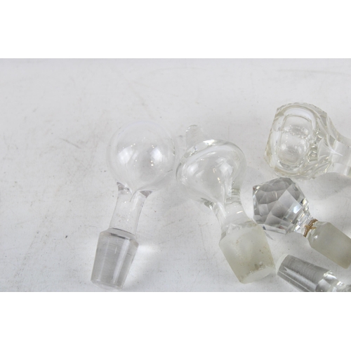 337 - A collection of glass decanter stoppers