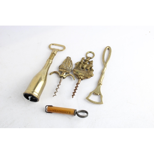 388 - Five antique and later corkscrews