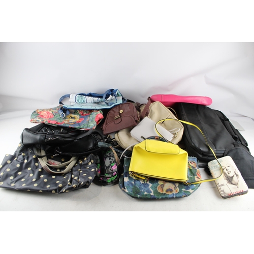 437 - A collection of ladies handbags and purses