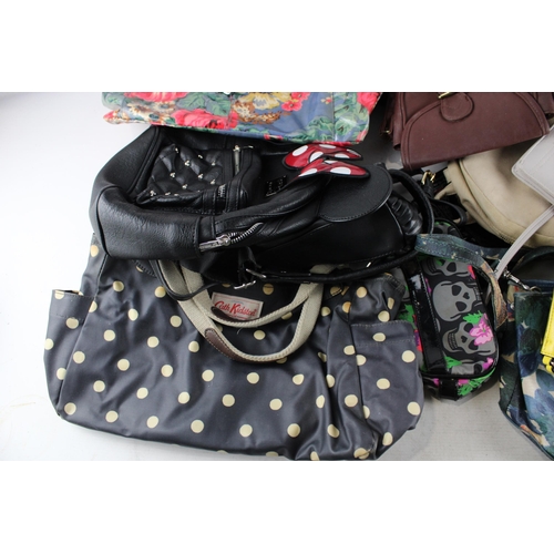 A collection of ladies handbags and purses
