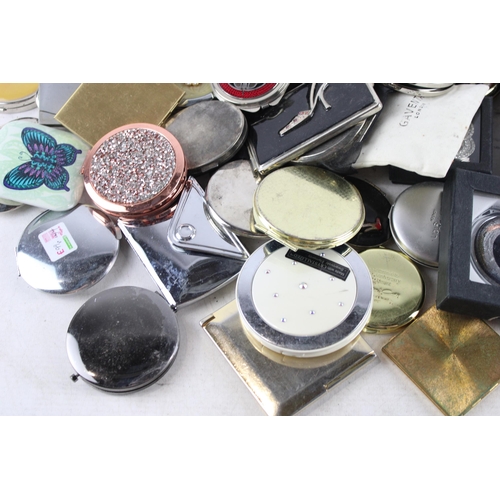 442 - A collection of assorted compact mirrors