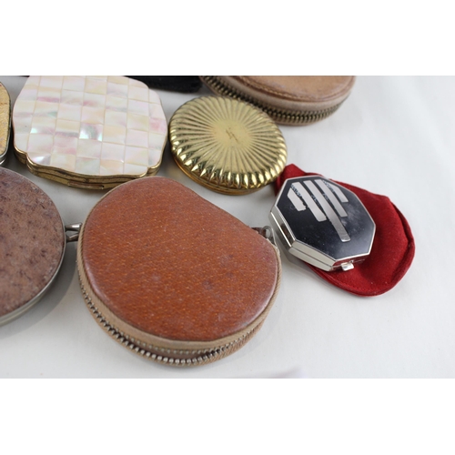 447 - Twelve assorted powder compacts