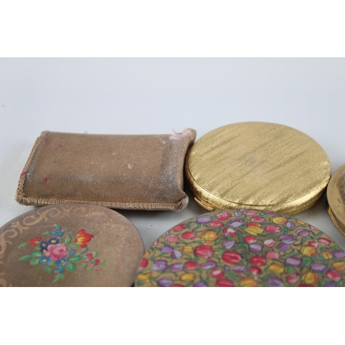 448 - Eleven assorted powder compacts