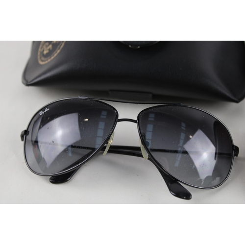 453 - Three pairs of cased Ray-Ban sunglasses