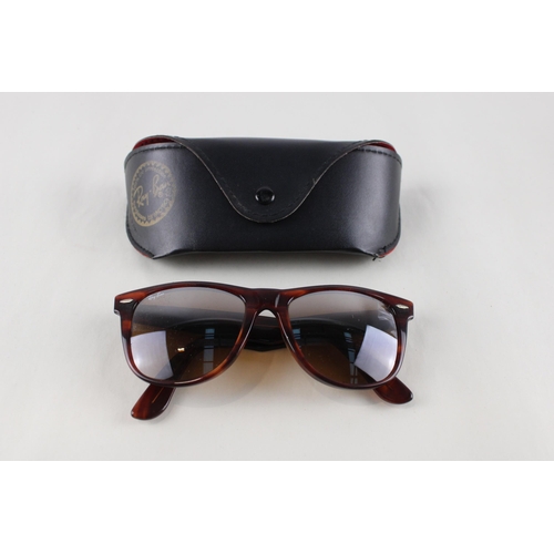 454 - A pair of cased Bausch & Lomb Ray-Ban Wayfarer II tortoiseshell effect sunglasses