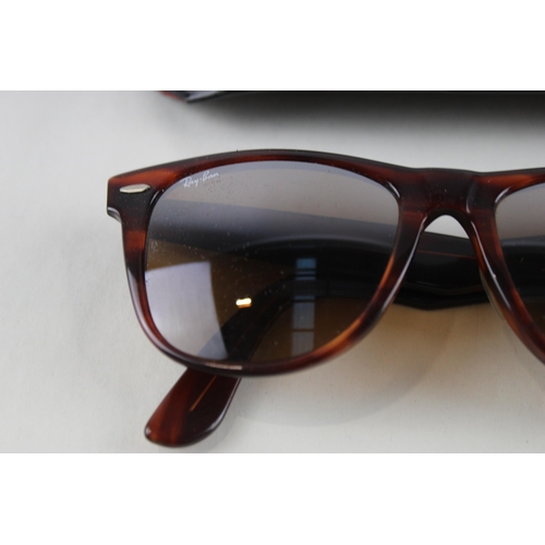 454 - A pair of cased Bausch & Lomb Ray-Ban Wayfarer II tortoiseshell effect sunglasses