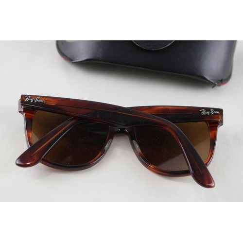 454 - A pair of cased Bausch & Lomb Ray-Ban Wayfarer II tortoiseshell effect sunglasses