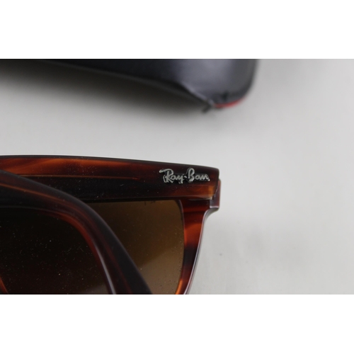 454 - A pair of cased Bausch & Lomb Ray-Ban Wayfarer II tortoiseshell effect sunglasses