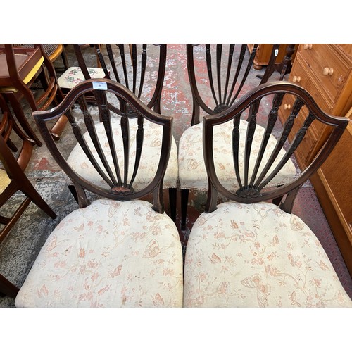 90 - Four 19th century mahogany shield back dining chairs