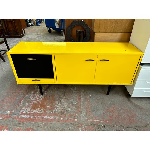 147 - A mid 20th century yellow and black vinyl wrapped sideboard - approx. 76cm high x 168cm wide x 44cm ... 