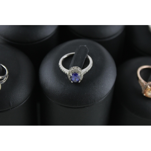 2025 - Eight silver gemstone set dress rings - approx. gross weight 34g