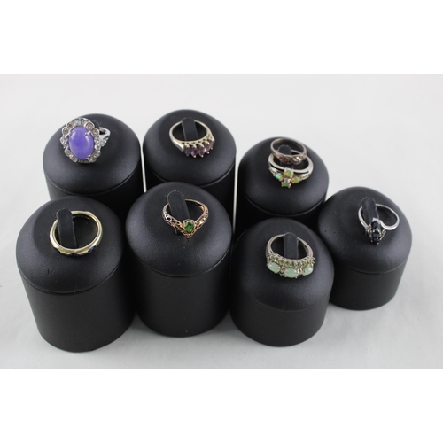 2028 - Eight silver gemstone set rings to include sapphire, opal etc. - approx. gross weight 32g