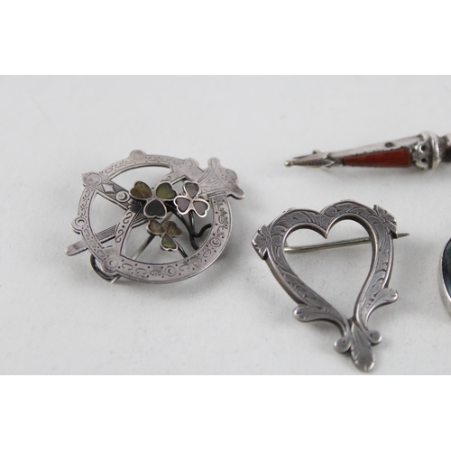 2034 - Five pieces of antique Scottish revival silver jewellery to include agate padlock etc. - approx. gro... 