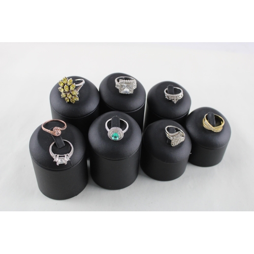 2037 - Eight silver gemstone set dress rings - approx. gross weight 37g