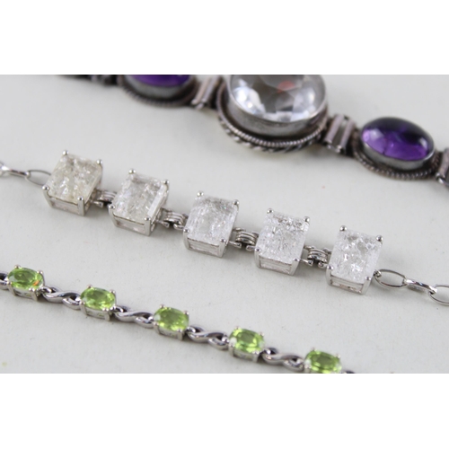 2055 - Three silver gemstone set bracelets to include moonstone, peridot etc. - approx. gross weight 40g