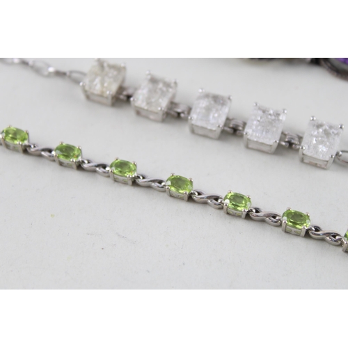 2055 - Three silver gemstone set bracelets to include moonstone, peridot etc. - approx. gross weight 40g